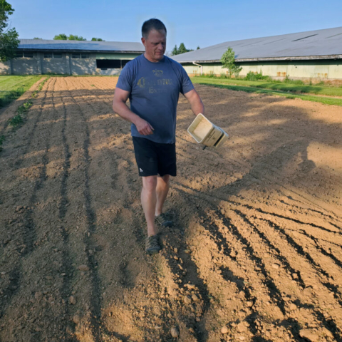 Jim seeding the Dairy Garden in the summer of 2021